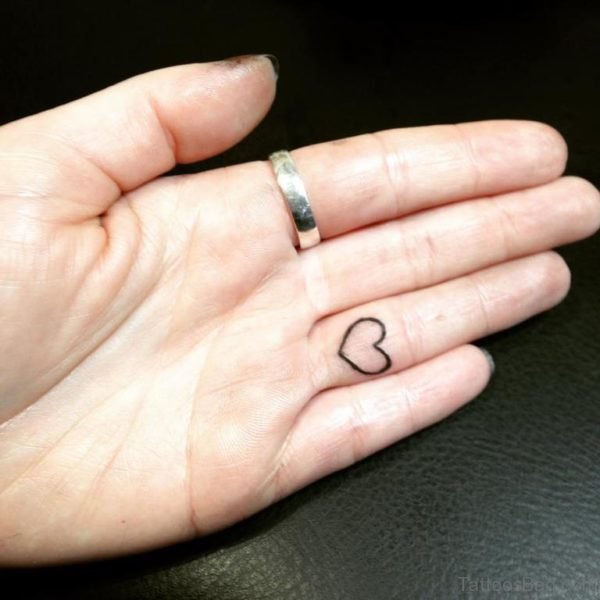 Heart Shaped Tattoo On Finger