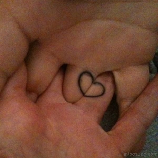 Heart Tattoo On Ring Finger