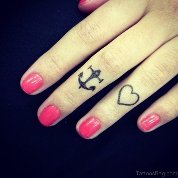 Heart With Anchor Tattoo On Girl Fingers
