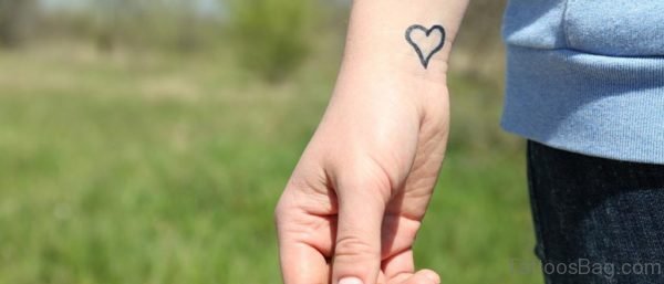 Heart Wrist Outline Tattoo