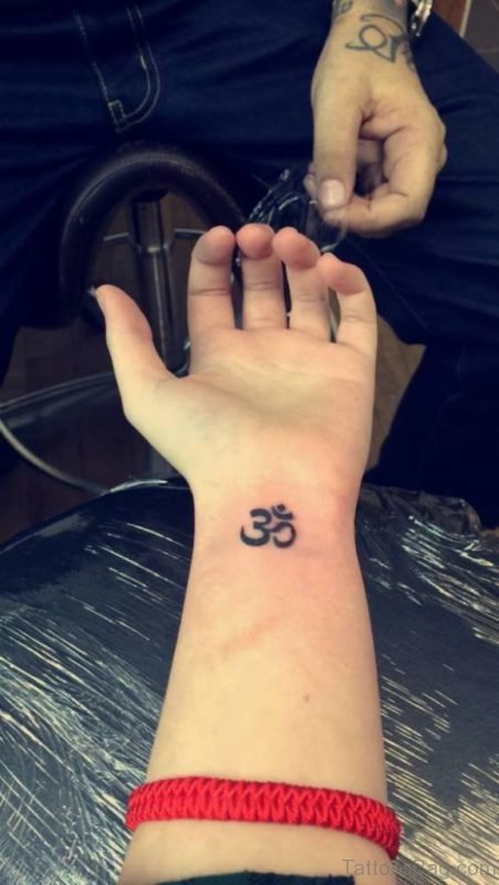 Impressive Om Tattoo On Wrist