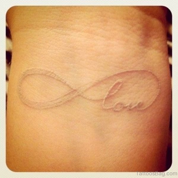 Infinity Love White Ink Tattoo On Wrist