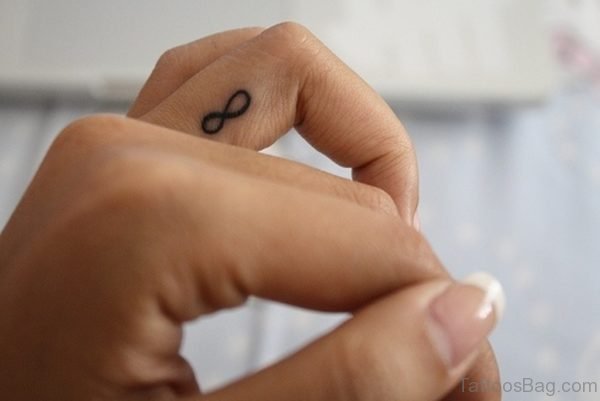Infinity Symbol Tattoo Design On Finger