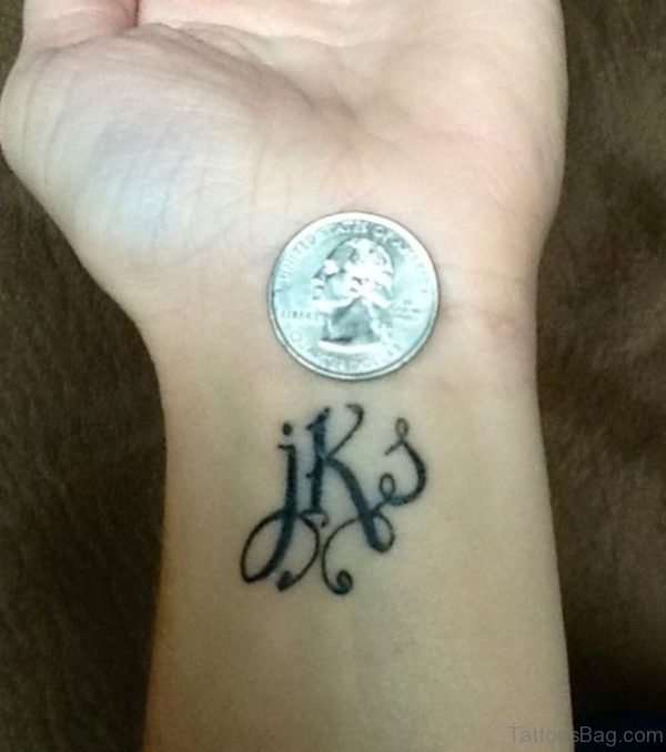 Initials Word Tattoo On Wrist