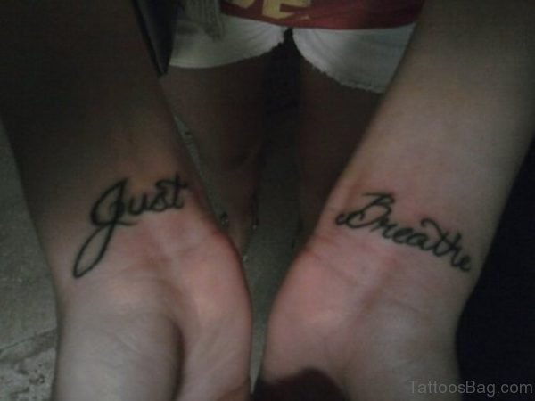 Awesome Just Breathe Wording Tattoo On Wrist 