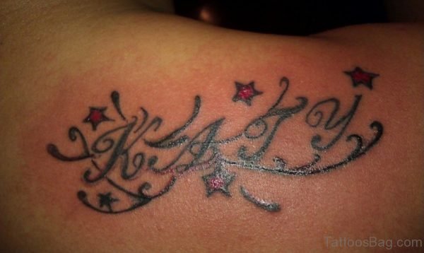 Lettering And Star Tattoo