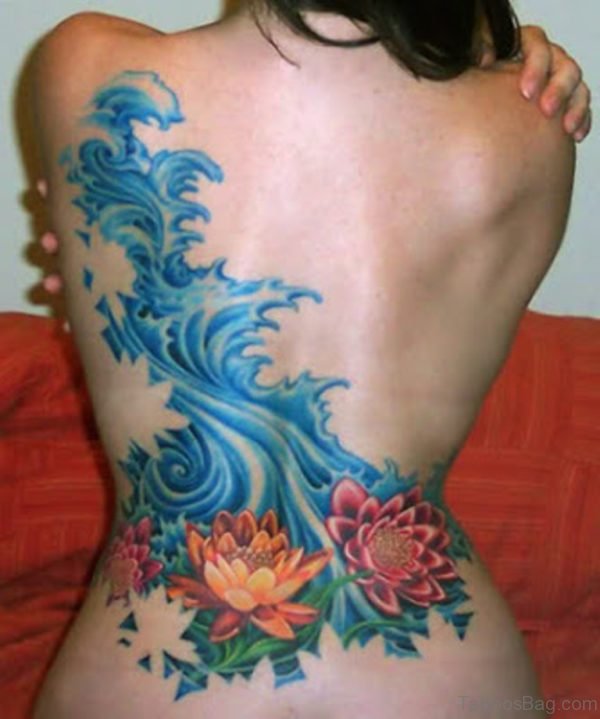 Lily Flower Tattoo On Lower Back 