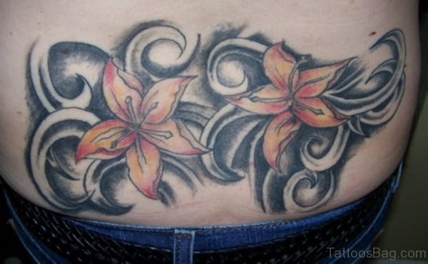 Lily Tattoo On Lower Back 