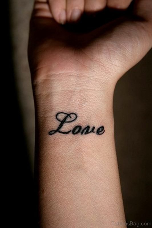 Love Word Tattoo On Wrist For Girls