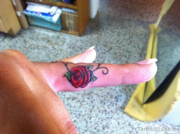 Lovely Red Rose Tattoo On Finger