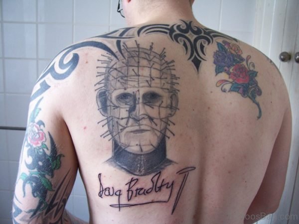 Man Face Tattoo On Back