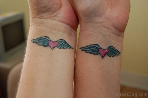 Matching Heart With Wings Tattoo