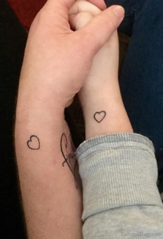 Matching Hearts Tattoo On Wrist