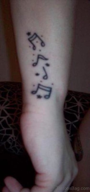 Amazing Music Notes Tattoo 