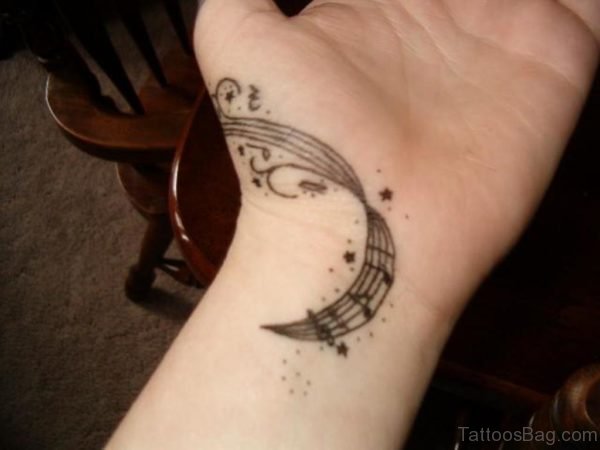 Nice Music Tattoo Design On Wrist 