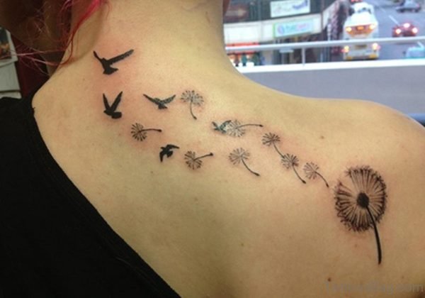 Nice Bird  Tattoo On Upper Back 