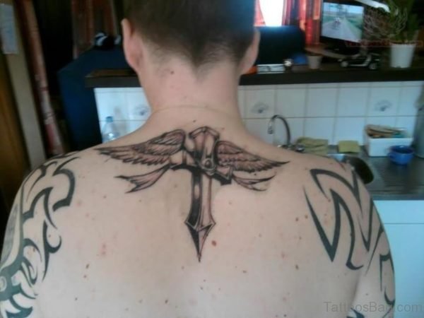 Nice Cross And Wings Tattoo