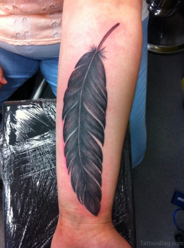 Nice Feather Tattoo On Wrist