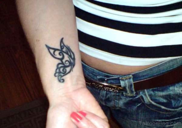 Nice Tribal Butterfly Tattoo On Wrist