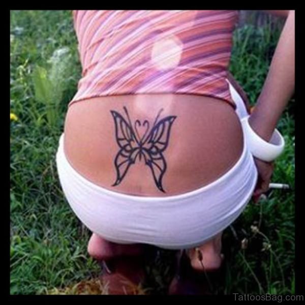 Outline Butterfly Tattoo On Lower Back