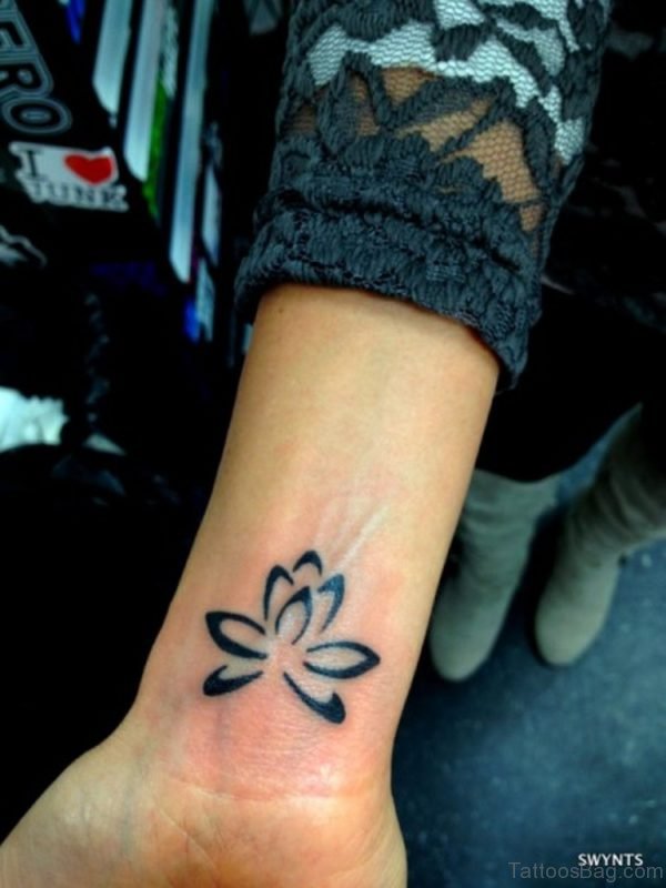 Outline Lotus Tattoo On Wrist 