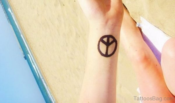 Peace Sign Tattoo On Wrist