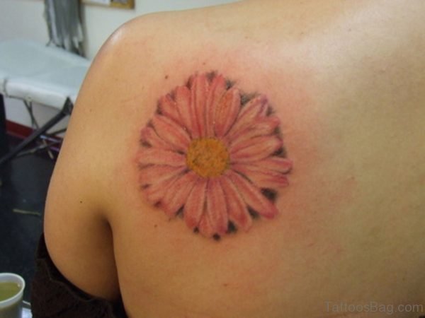 Pink Daisy Tattoo On Back 