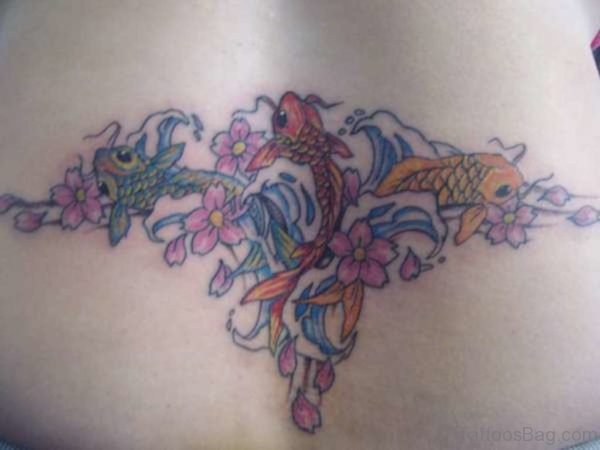 Pink Flower And Fish Tattoo