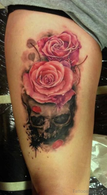 Pink Roses On Skull Tattoo On Thigh