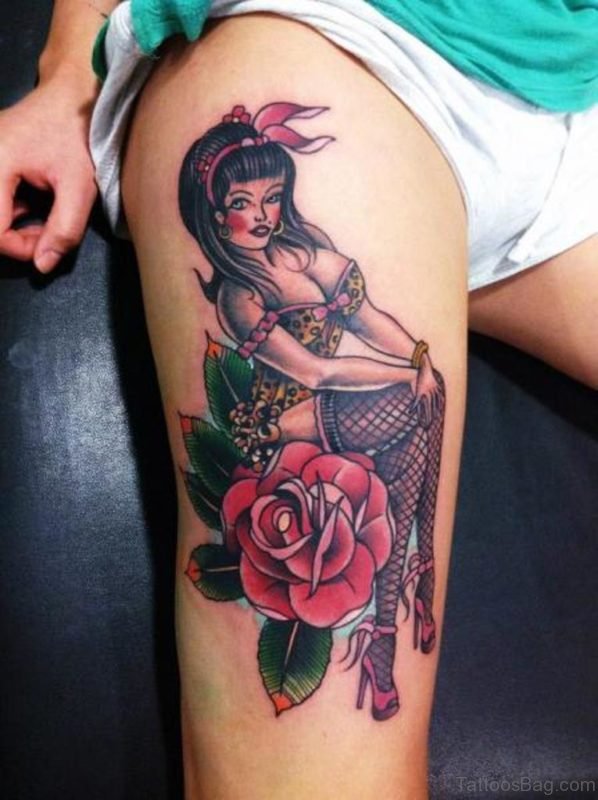 Pinup On Red Rose Tattoo On Thigh
