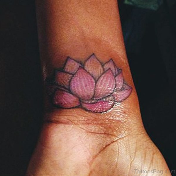 Nice Pink Lotus Tattoo On Wrist