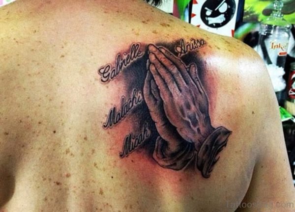 Praying Hands Tattoo On Back