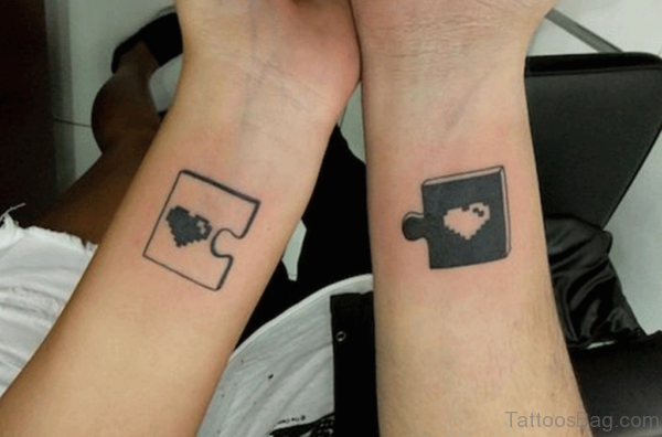 Puzzle Love Tattoo On Wrist
