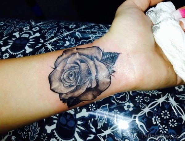 Realistic Black Rose Tattoo On Wrist