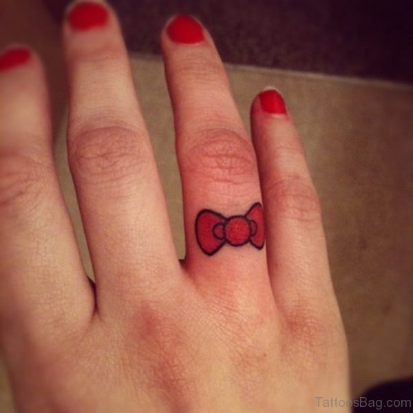 Red Bow Tattoo On Finger