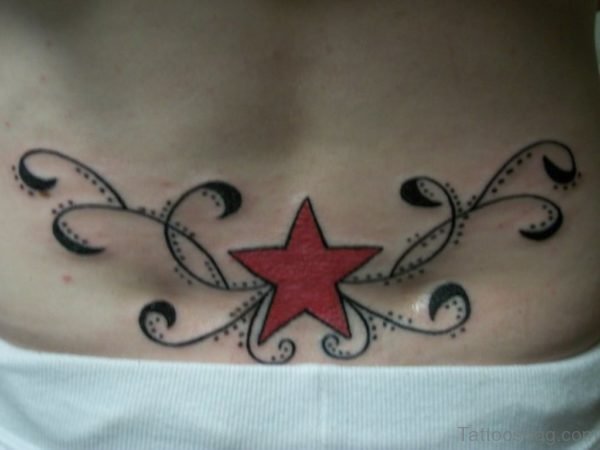 Red Star Tattoo On Lower Back
