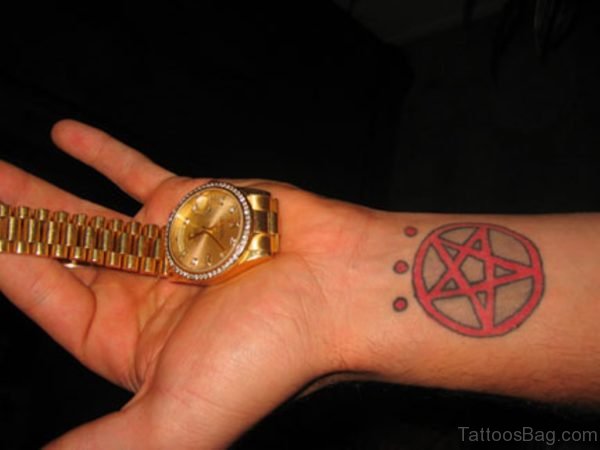 Red Star Tattoo On Wrist