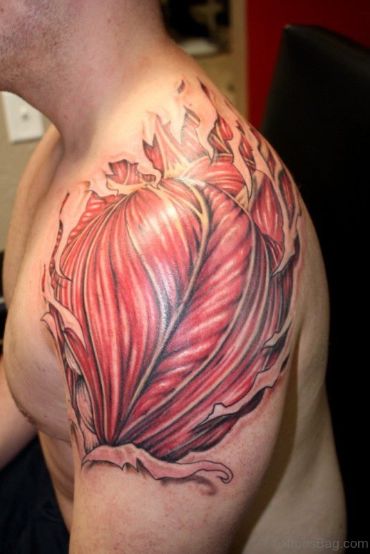 Rip Skin Muscle Tattoo On Right Shoulder