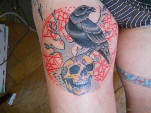 Roaring Black Crow And Yellow Skull Tattoo