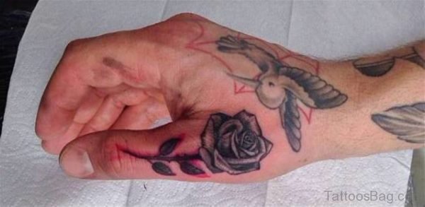 Rose Tattoo On Thumb