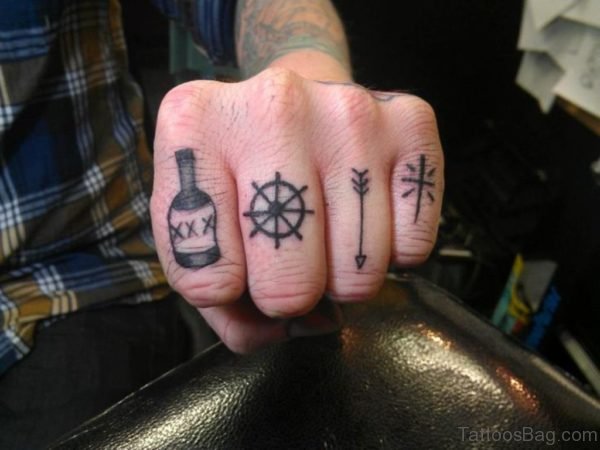 Ship Wheel And Arrow Tattoo