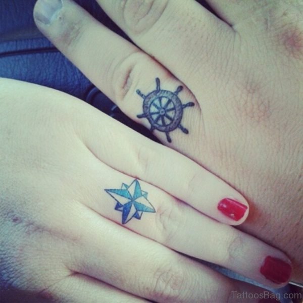 Ship Wheel And Star Tattoo