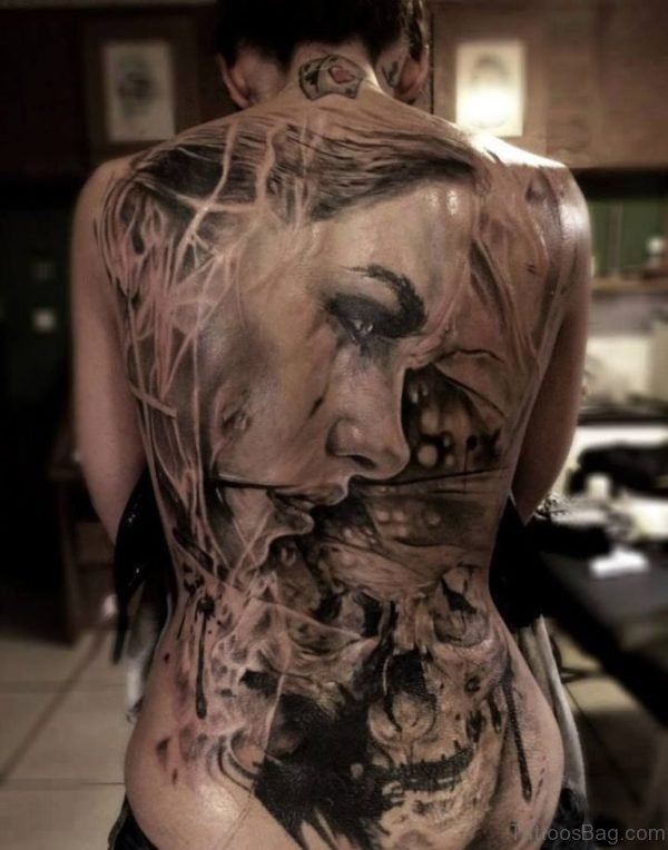 Skull And Girl Face Tattoo On Back