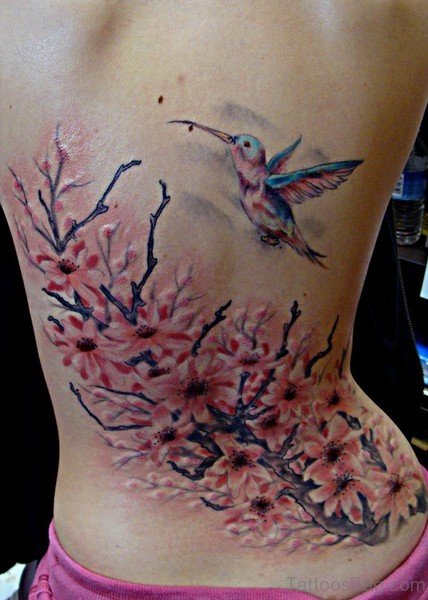 Small Bird And Cherry Blossom Tattoo