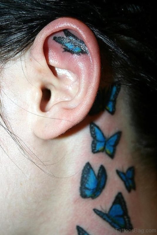 Small Blue Butterfly Tattoo On Neck