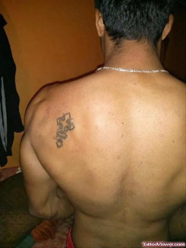 Small Cross Tattoo On Back
