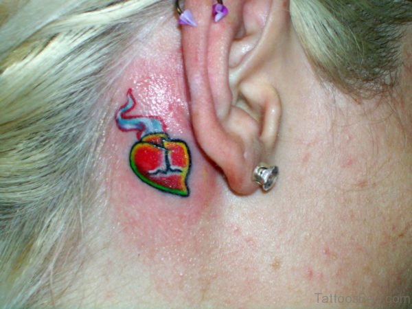 Small Red Heart Neck Tattoo