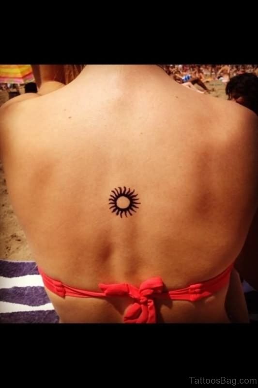 Small Sun Tattoo On Back