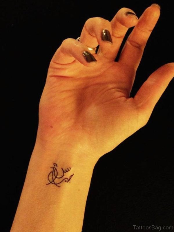 Small Words Tattoo On Wrist
