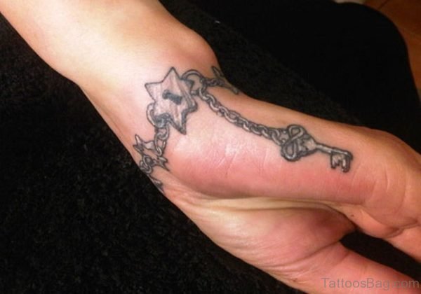 Star Bracelet And Key Tattoo